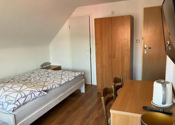 Δωμάτια σε οικογενειακή κατοικία Agat Goscinne *